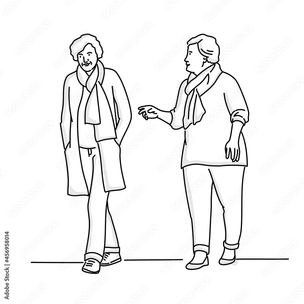 Two elderly women walk talking. Two elderly women walk talking.