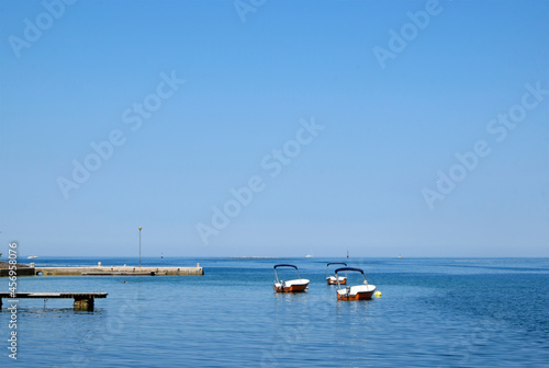 Boats in the sea. Seascape background, blue horizon. Istria, Croatia