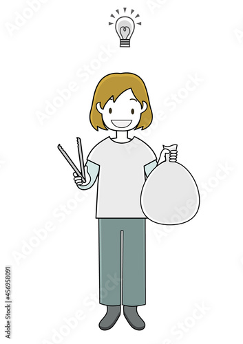 ゴミ拾いのボランティアをする女の子（ゴミ削減のアイディア等のひらめきをイメージ）