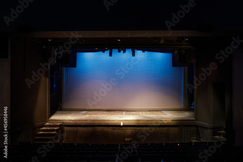 Empty Stage Lit in Blue and Yellow Lights on Cyclorama photo