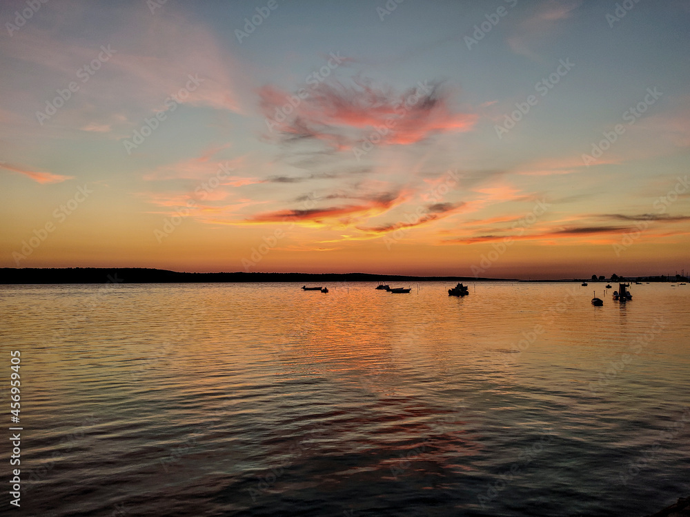 wonderful sunset in croatia with boats in the middle at sunset wonderful sunset in croatia with boats in the middle at sunset