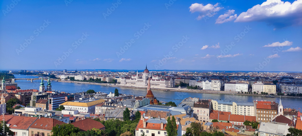 View of the Danube river and houses on the banks of the Pest and Buda. Historic district and Parliament Building in Budapest. Hungary. Europe