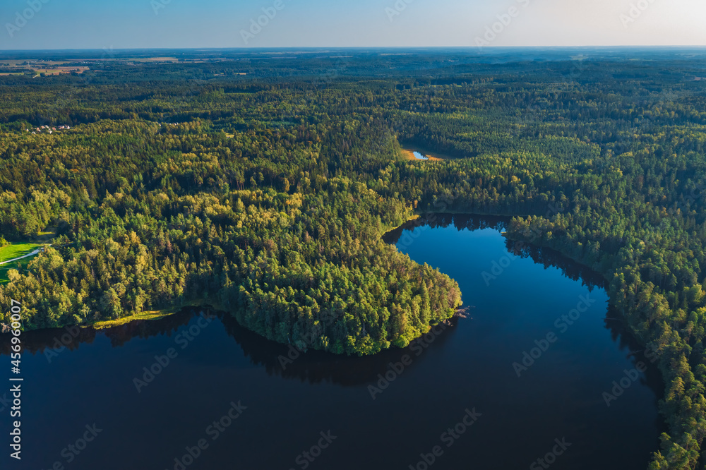 Aerial view of wild forest lake in Lithuania