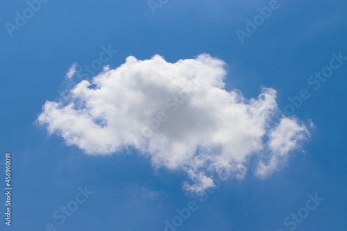 The fluffy white cloud in the blue sky. © Al