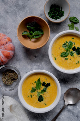 Pumpkin soup made from fresh orange butternut with coconut milk. Delicious vegan, seasonal autumn food.