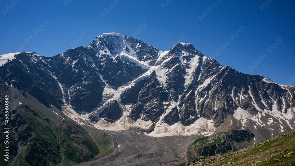 Part of Glacier Seven on mount Donguzorun. View from Mount Cheget, Kabardino Balkaria region. Russia. 3000 metres height. Lifting on Cable Car. View on Donguzorun mount. Panorama.