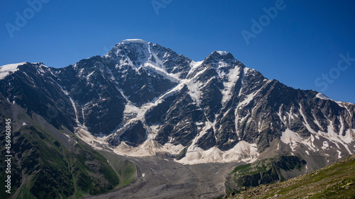 Part of Glacier Seven on mount Donguzorun. View from Mount Cheget, Kabardino Balkaria region. Russia. 3000 metres height. Lifting on Cable Car. View on Donguzorun mount. Panorama.