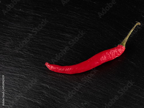 Red chili pepper hot and spicy dark background