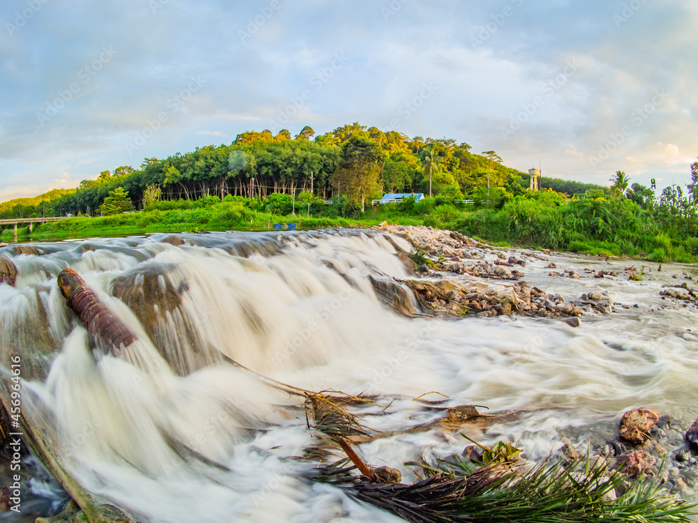 The river flows through a beautiful small dam. Small dams in rural ...
