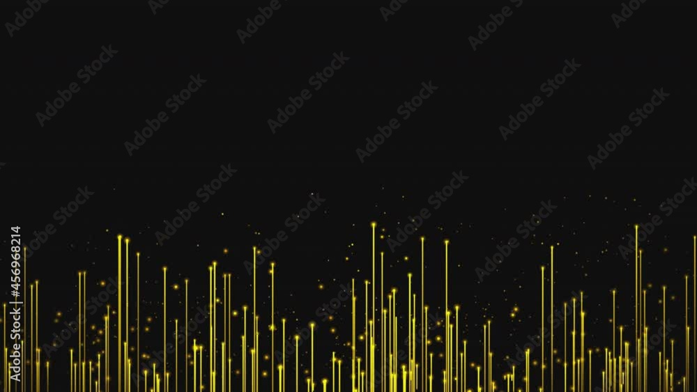 Gold glittering particles abstractly move in space on a transparent background. 