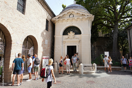RAVENNA, ITALY - AUGUST 10, 2021: people visiting the tomb of Dante Alighieri Italian poet in Ravenna on the occasion of the 700th anniversary of his death