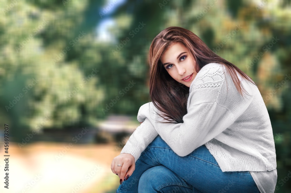 Portrait of a young woman breathing fresh air in a forest Portrait of a young woman breathing fresh air in a forest