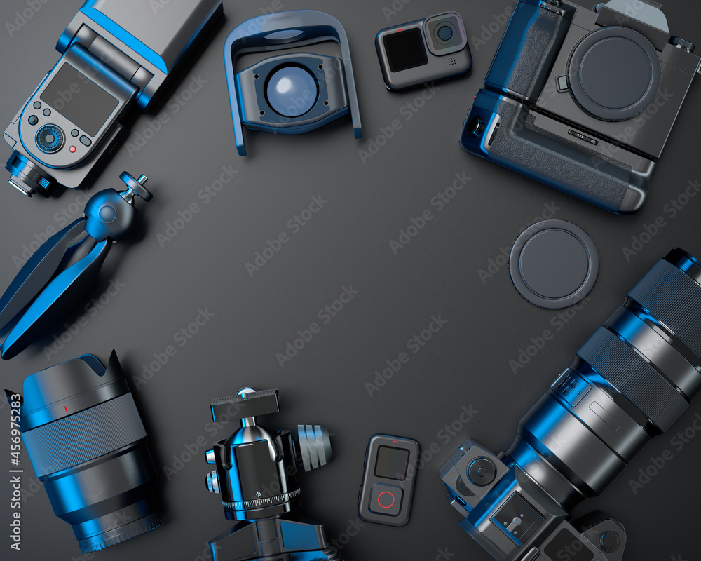 Top view of designer workspace and photography gear on black table background Top view of designer workspace and photography gear on black table background