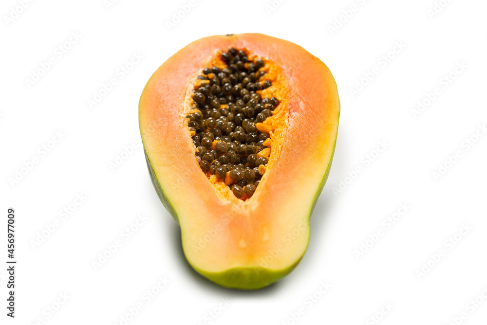 Papaya fruit isolated on a white background. Tropical fruit. Half papaya. Papaya fruit isolated on a white background. Tropical fruit. Half papaya.