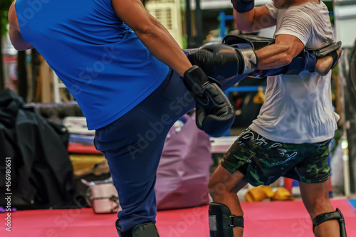 Sparring thai boxing in a boxing stadium. © dsom