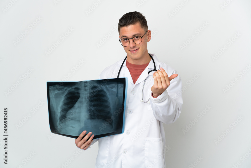 Professional traumatologist on white background inviting to come with hand. Happy that you came Professional traumatologist on white background inviting to come with hand. Happy that you came
