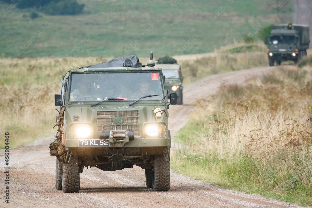 A British army Steyr-Daimler-Puch - BAE Systems Pinzgauer high-mobility 6x6 AWD all-terrain utility vehicle on military battle exercise Wilts UK