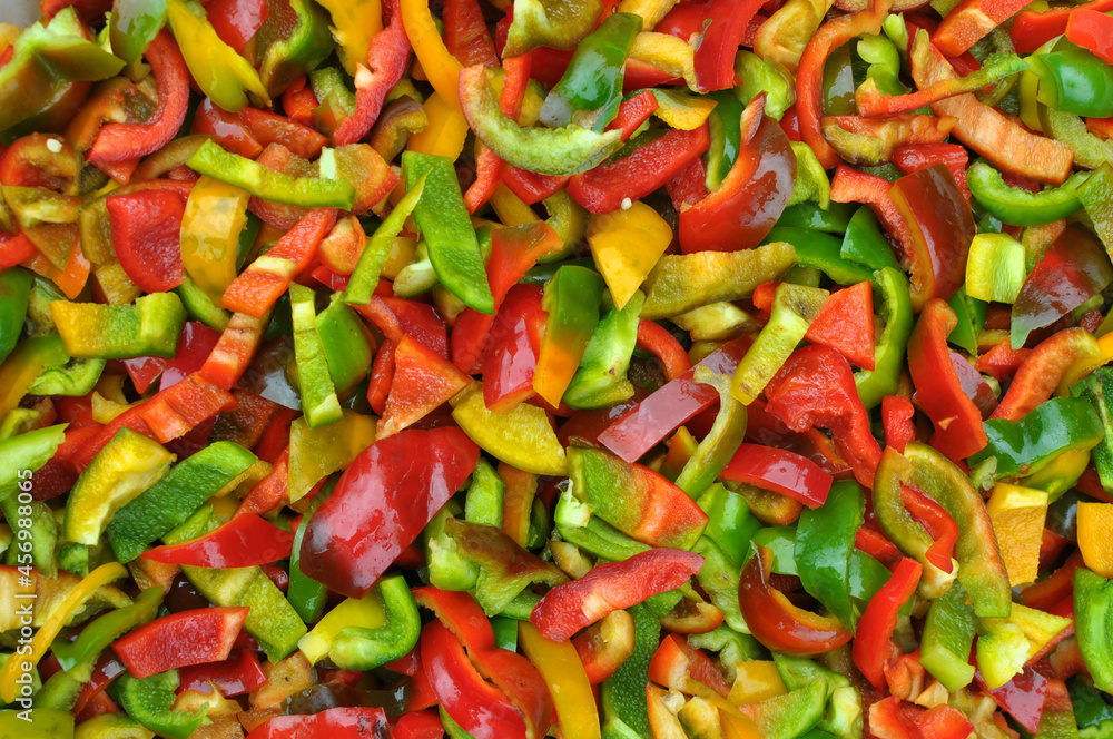 Multicolored vegetable background with bell peppers Multicolored vegetable background with bell peppers