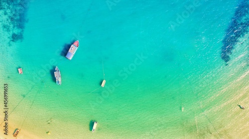 seascpae top view of many boats in tropical clear blue turquoise sea © Pornprasert