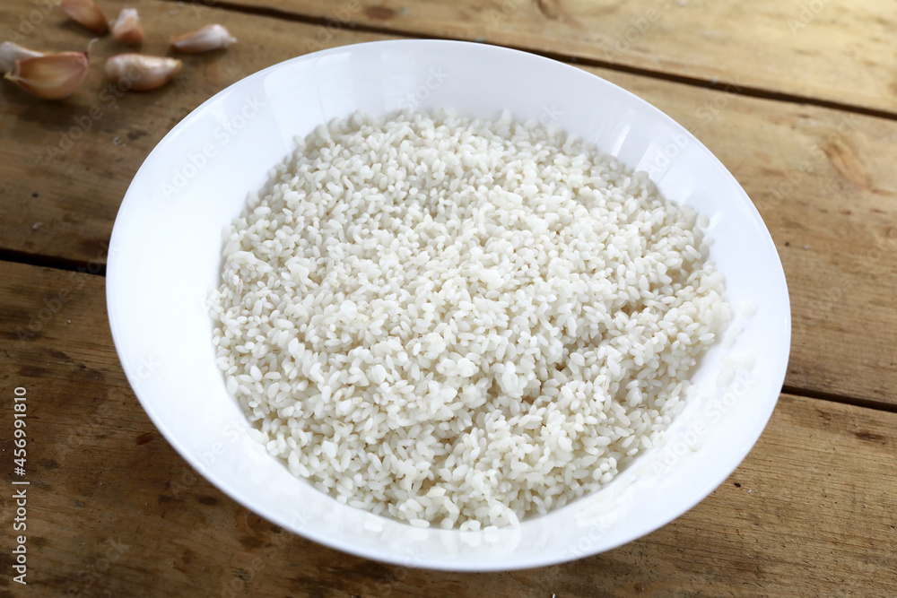 Plate of rice on table Plate of rice on table