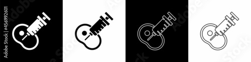 Set Genetically modified meat icon isolated on black and white background. Syringe being injected to meat. Vector