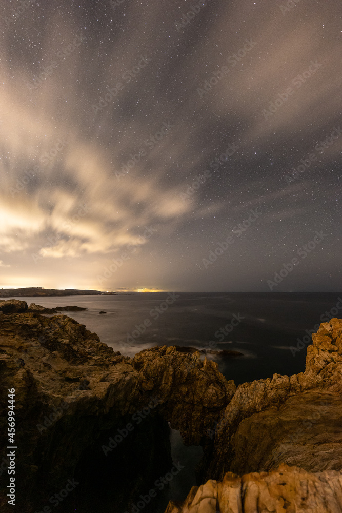 Summer night with milky way, crescent moon and Perseids on the coast!