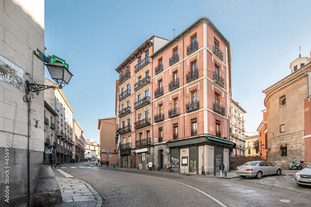 Vintage buildings on the rise of Segovia street through the historic center of Madrid