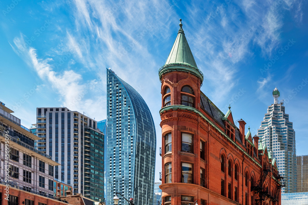 Architecture contrast of the Gooderham building with the downtown district in Toronto Canada