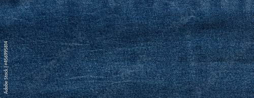 texture of blue jeans denim fabric background 