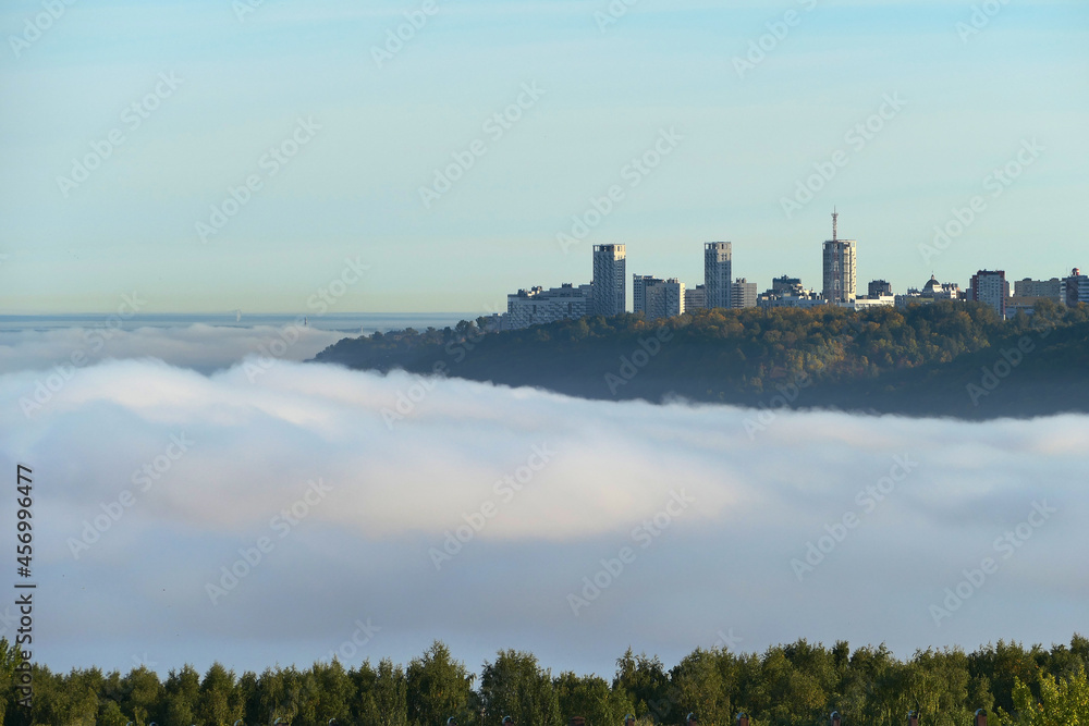Morning fog in autumn over the city.