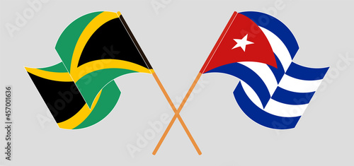 Crossed and waving flags of Jamaica and Cuba