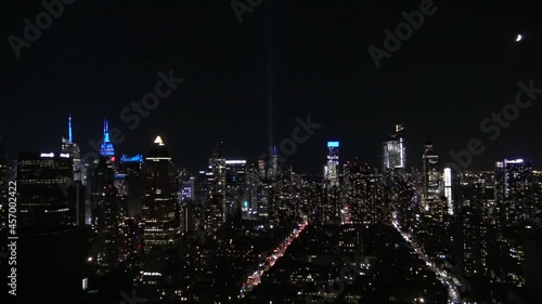 911 lights and the freedom tower on the top of Manhattan skyline