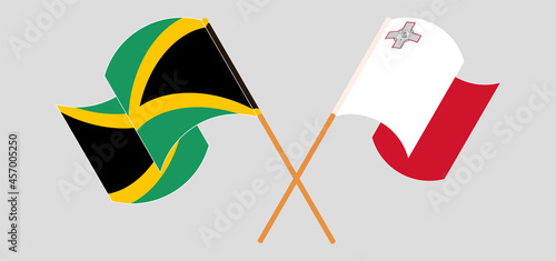 Crossed and waving flags of Jamaica and Malta