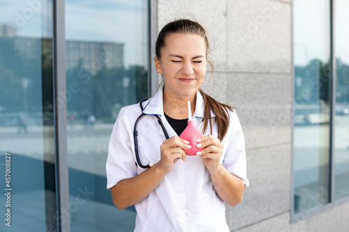 Photos Medicine, healthcare, profession and people concept - A funny European woman doc