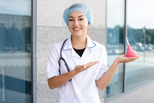 Canvastavla Medicine, profession and people concept - A smiling European woman nurse in a wh