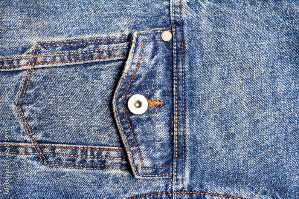 Texture backdrop photo of blue colored denim cloth with pocket and seams. Texture backdrop photo of blue colored denim cloth with pocket and seams.