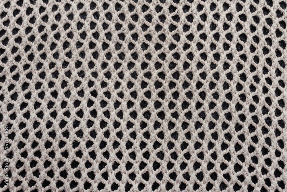 Knitted mesh fabric cloth texture backdrop photo. Knitted mesh fabric cloth texture backdrop photo.