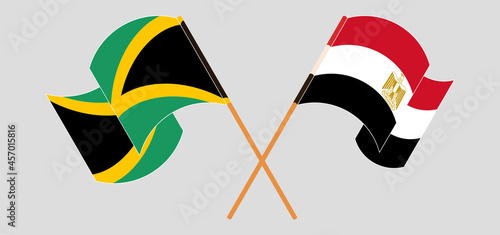 Crossed and waving flags of Jamaica and Egypt
