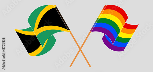 Crossed and waving flags of Jamaica and LGBTQ