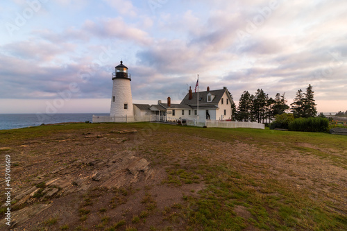 Pemaquid Point Lighthouse in Bristol, Maine, at sunset on a summer evening