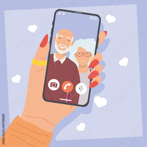 smartphone in video call with grandparents
