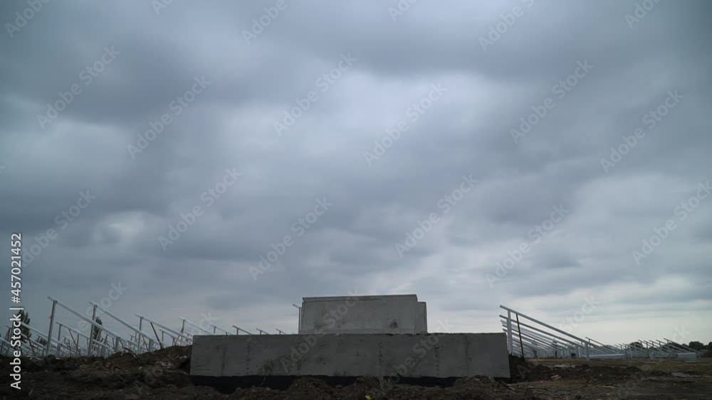 Timelapse of the sky over the construction site of a solar power station Timelapse of the sky over the construction site of a solar power station