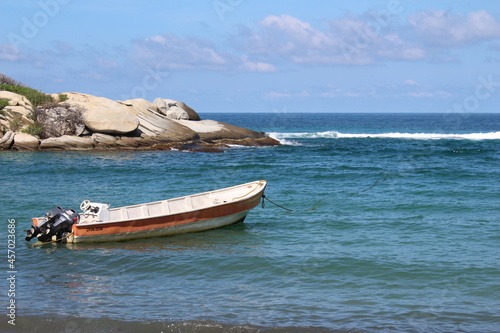 fishing boat on the beach. Tayrona park  Santa Marta  Colombia. 
