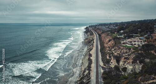 Aerial view of Amtrak train tracks by the coast in Del Mar, California photo