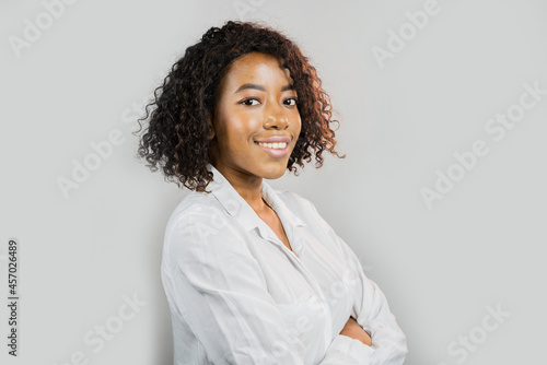 african woman doctor portrait. Woman hospital worker looking at camera and smiling