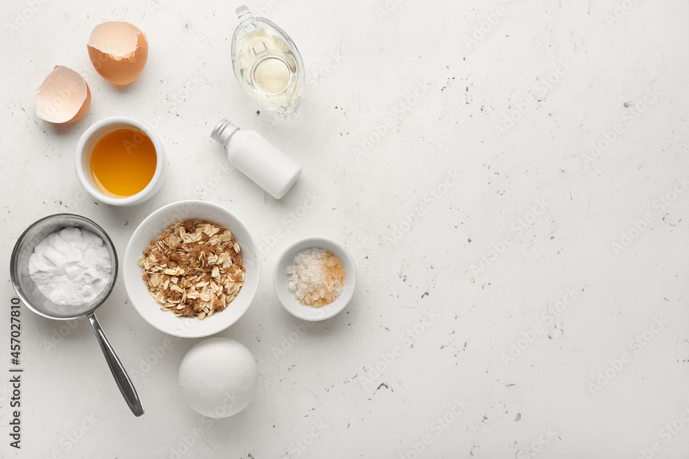 Different natural ingredients for homemade cosmetics on white background Different natural ingredients for homemade cosmetics on white background