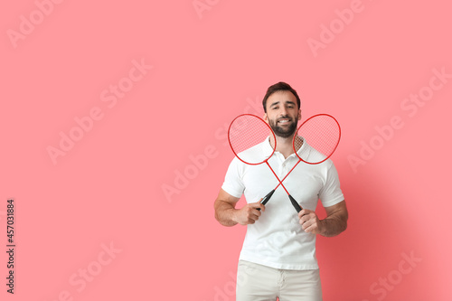 Sporty male badminton playe...