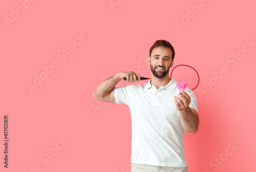 Sporty male badminton playe...