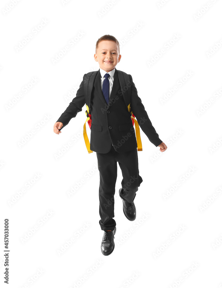 Jumping little schoolboy on white background Jumping little schoolboy on white background