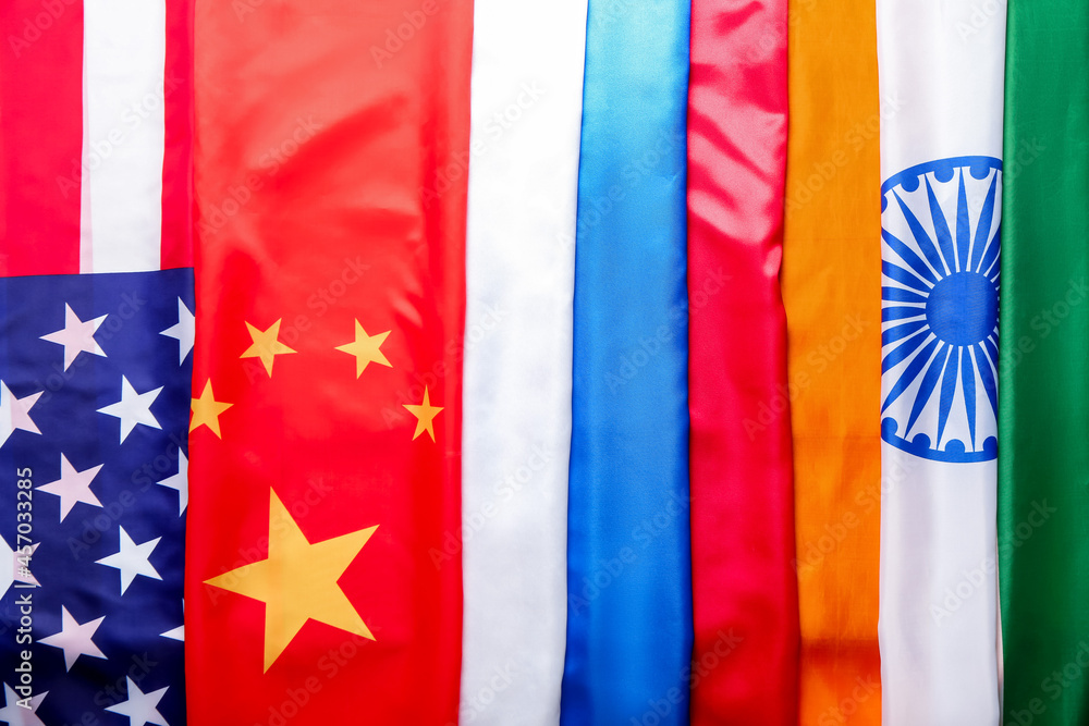 Different flags as background, closeup